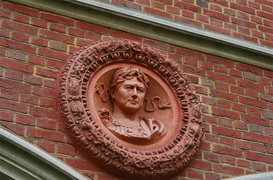 Round Ornamental Medallion on Building Facade Image
